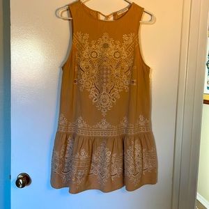 Spell  & The Gypsy M tam and cream sleeveless dress embroidered.